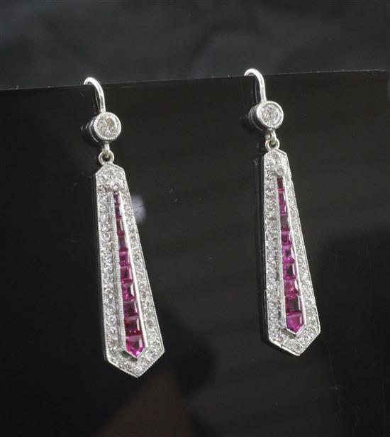 A pair of white gold, ruby and diamond drop earrings, 1.5in.